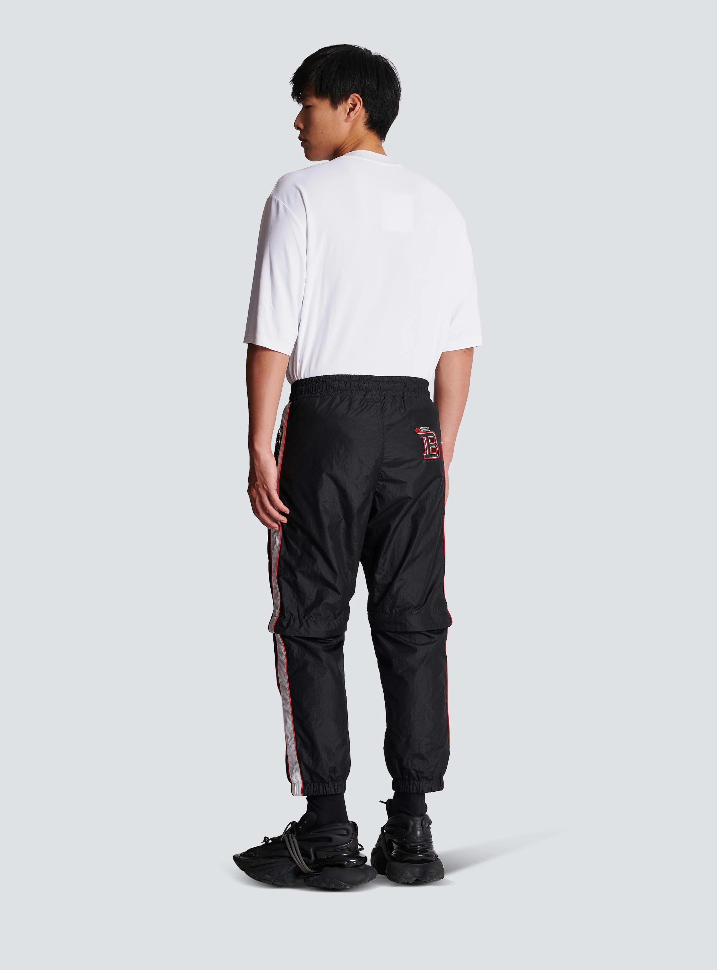 BALMAIN MEN'S BLACK NYLON CONVERTIBLE TRACK PANTS - Image 4