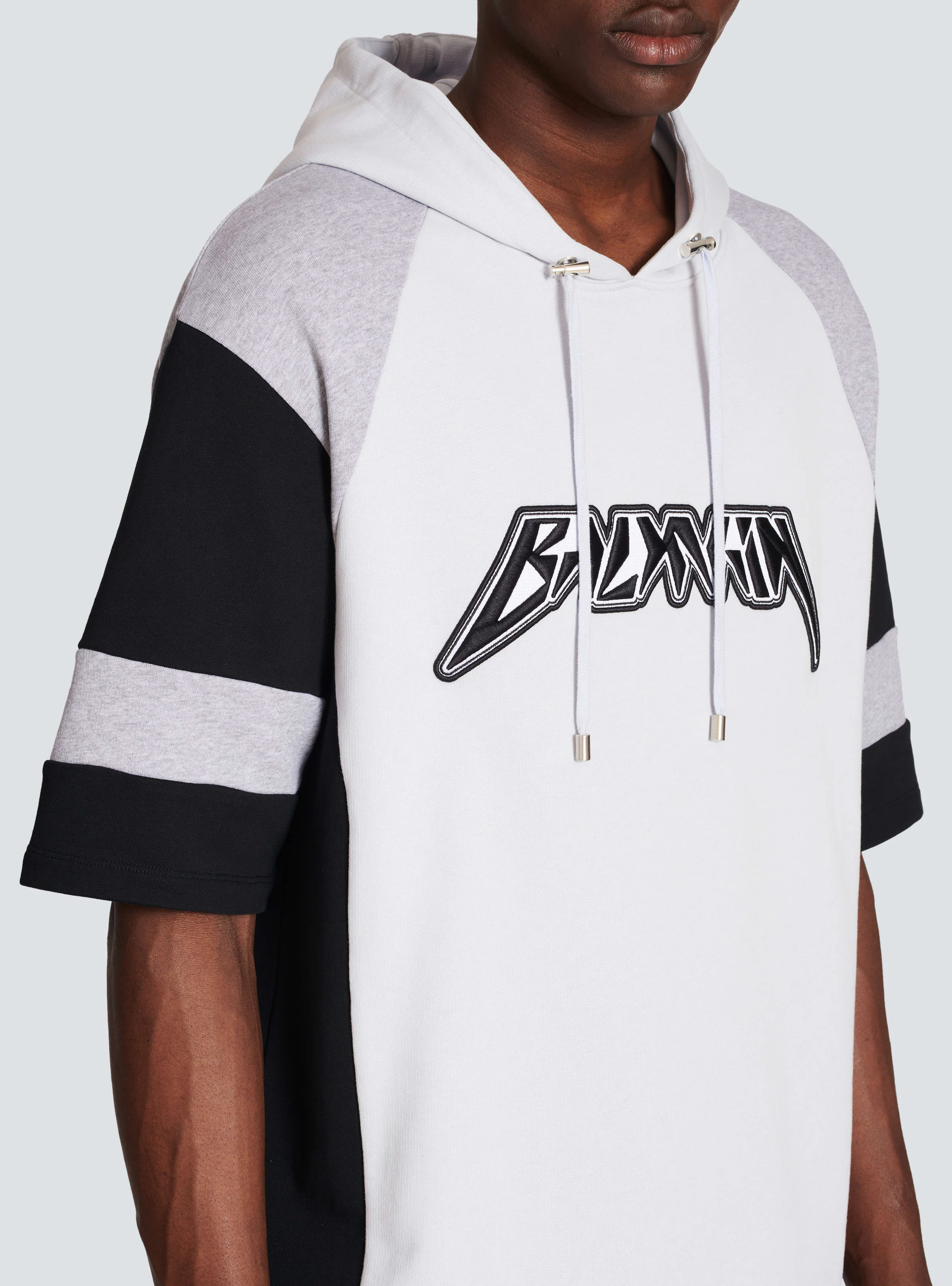 BALMAIN MEN'S LIGHT BLUE BLACK OVERSIZED HOODIE - Image 6